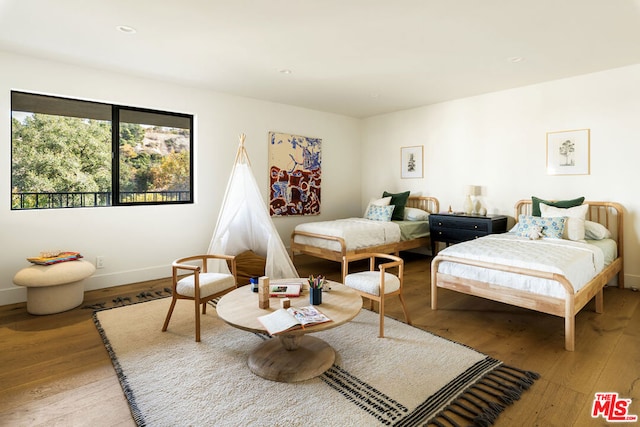 bedroom with light wood-type flooring