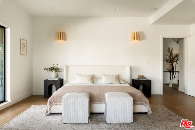 bedroom featuring hardwood / wood-style flooring