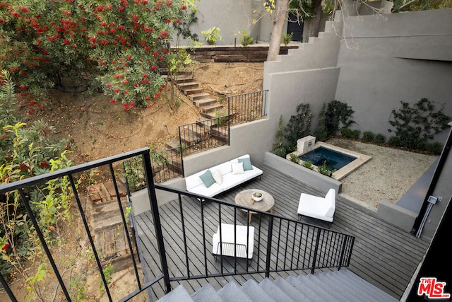 balcony with an outdoor hangout area