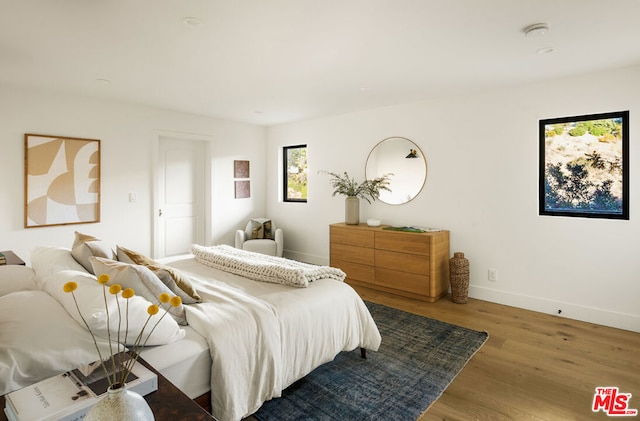 bedroom featuring hardwood / wood-style floors