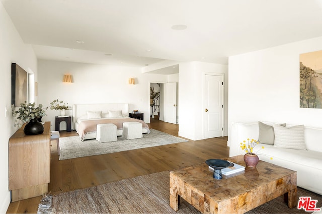 living room featuring dark hardwood / wood-style floors