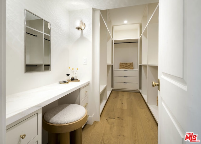 bathroom with hardwood / wood-style flooring