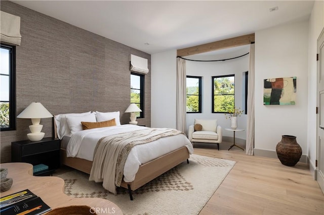 bedroom with light hardwood / wood-style floors