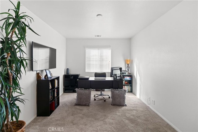 view of carpeted office space