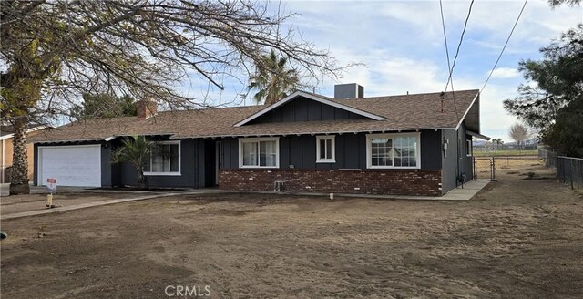 single story home with a garage