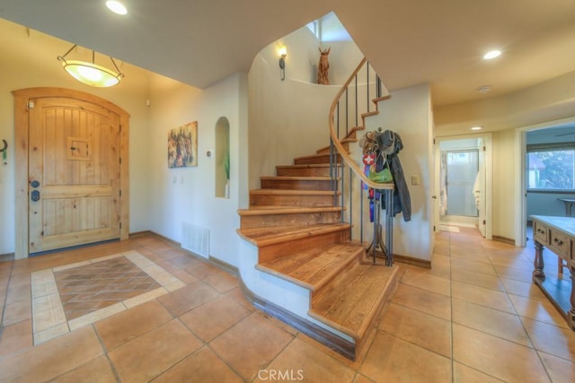 view of tiled entrance foyer