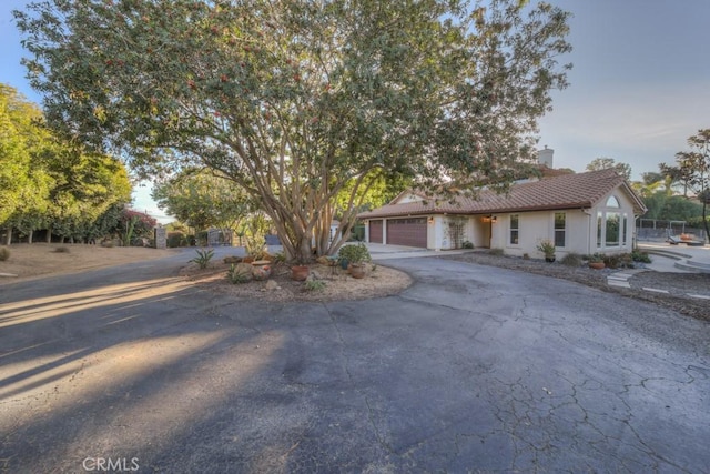 view of front of property with a garage