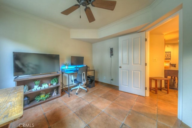 office area with ceiling fan, ornamental molding, and light tile patterned floors