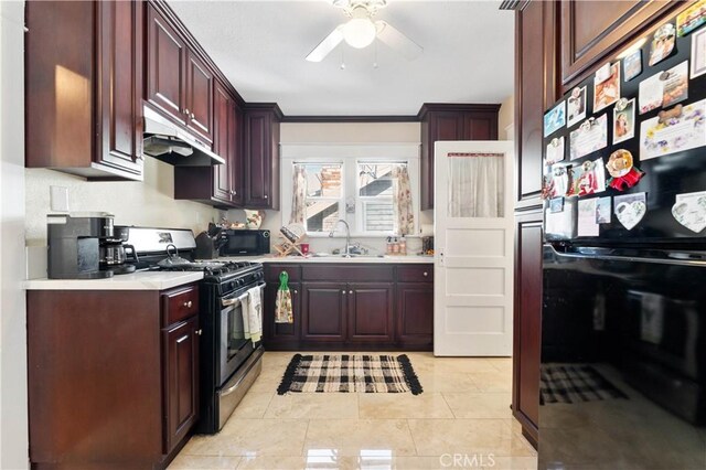 kitchen featuring light tile patterned floors, ceiling fan, black appliances, crown molding, and sink