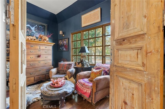 sitting room featuring wood-type flooring