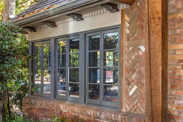 entrance to property featuring french doors