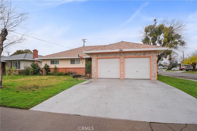 ranch-style house with a garage and a front lawn