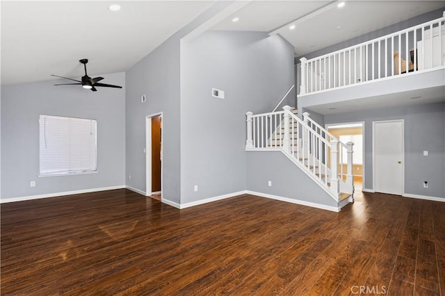 unfurnished living room with ceiling fan, dark hardwood / wood-style flooring, and high vaulted ceiling