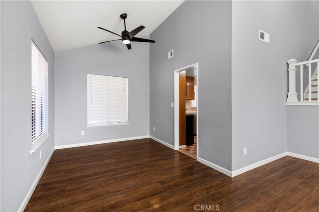 interior space featuring ceiling fan, dark hardwood / wood-style flooring, and high vaulted ceiling