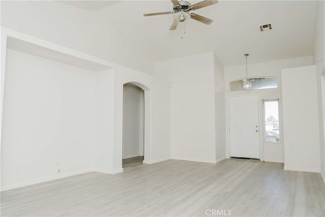 spare room featuring ceiling fan and light hardwood / wood-style floors