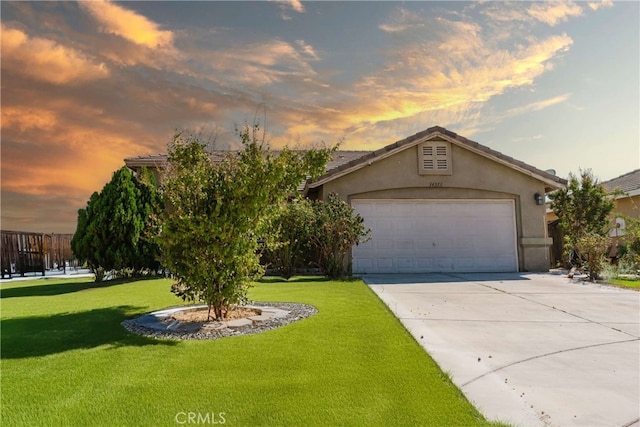 ranch-style house with a yard