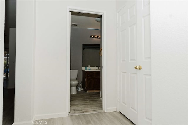 hall featuring light wood-type flooring