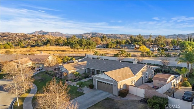 drone / aerial view featuring a mountain view