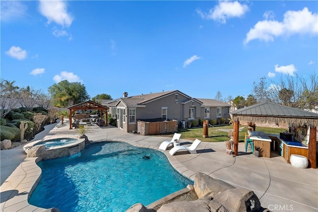 view of swimming pool with a gazebo, a bar, a patio, and an in ground hot tub