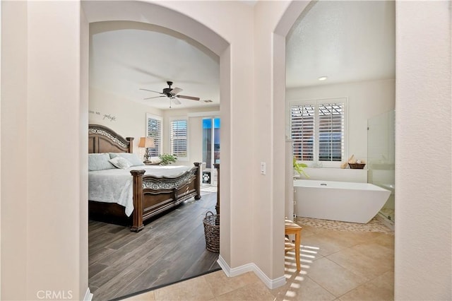 bedroom featuring hardwood / wood-style flooring and ceiling fan