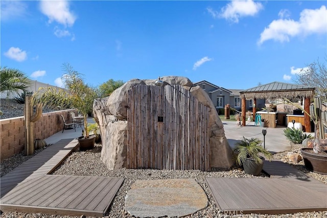 view of yard with a gazebo, a patio area, and a deck