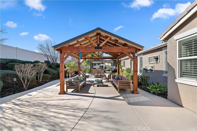 view of patio featuring a gazebo and an outdoor hangout area