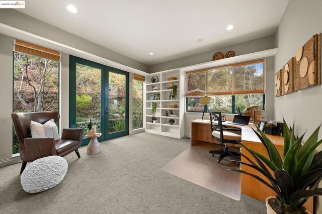 office area with light colored carpet and french doors