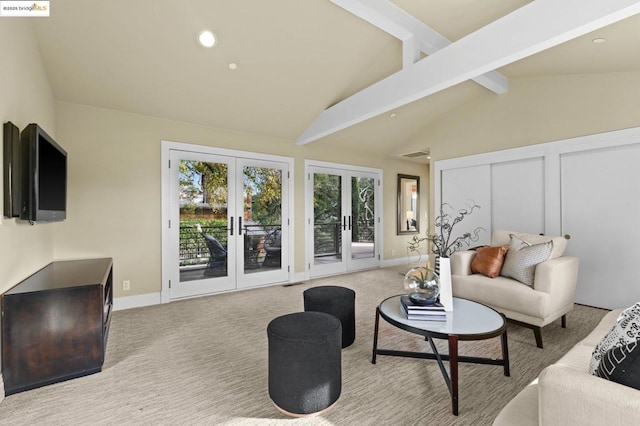 carpeted living room with french doors and vaulted ceiling with beams