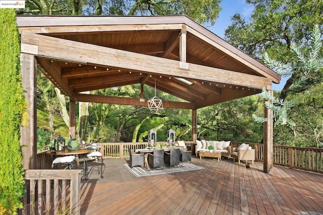 deck with an outdoor hangout area and a gazebo