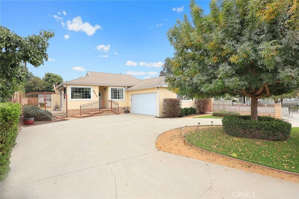 view of front of home with a garage