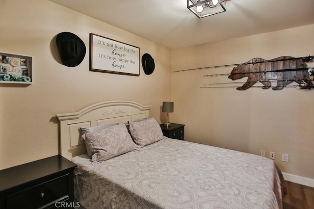 bedroom featuring wood-type flooring