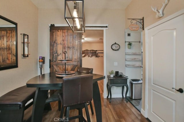 dining room with dark hardwood / wood-style flooring