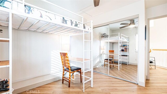 dining area featuring hardwood / wood-style flooring and ceiling fan