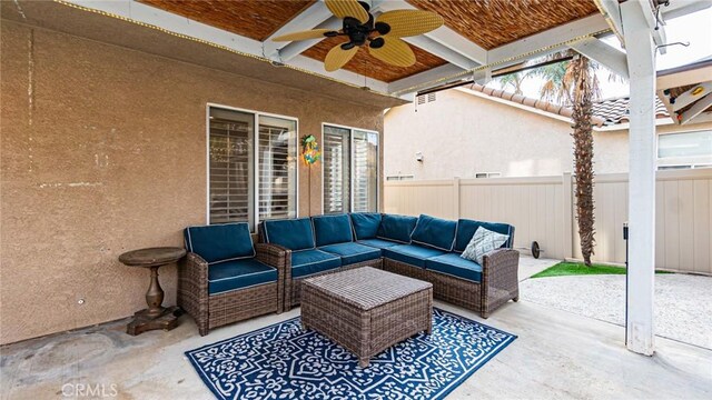 view of patio / terrace with ceiling fan and an outdoor hangout area