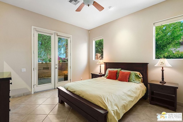 tiled bedroom with ceiling fan and access to outside