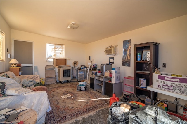 living room with an AC wall unit