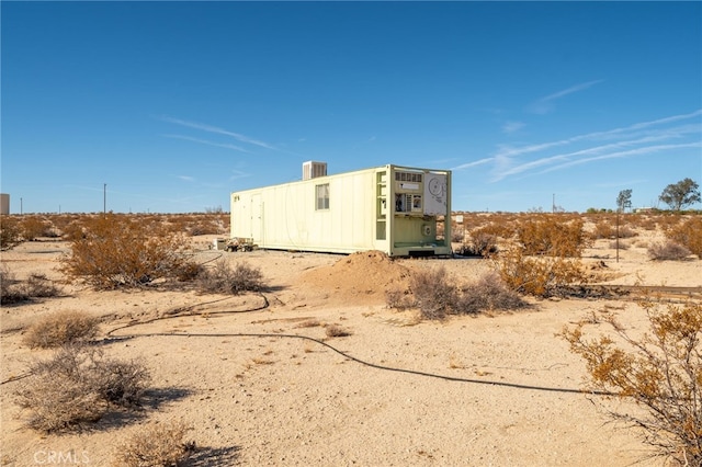 67970 Pioneer Trl Unit 29, Palms, CA 92277 - view of side of property featuring central AC unit