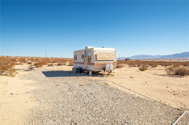 67970 Pioneer Trl Unit 29, Palms, CA 92277 - view of outdoor structure featuring a desert view, a mountain view, and a view of rural / pastoral area