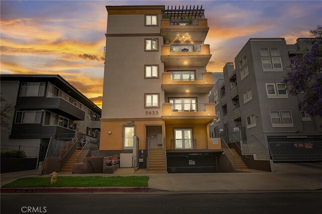 view of outdoor building at dusk