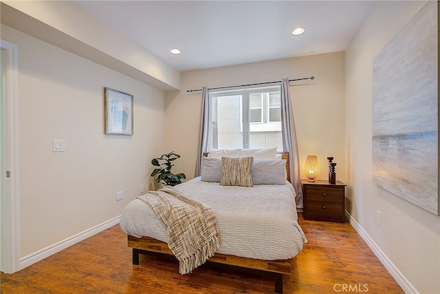 bedroom featuring hardwood / wood-style flooring