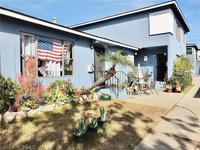 view of front of house with a patio