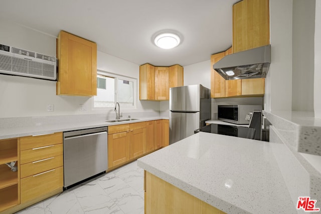 kitchen featuring light brown cabinetry, sink, stainless steel appliances, and exhaust hood