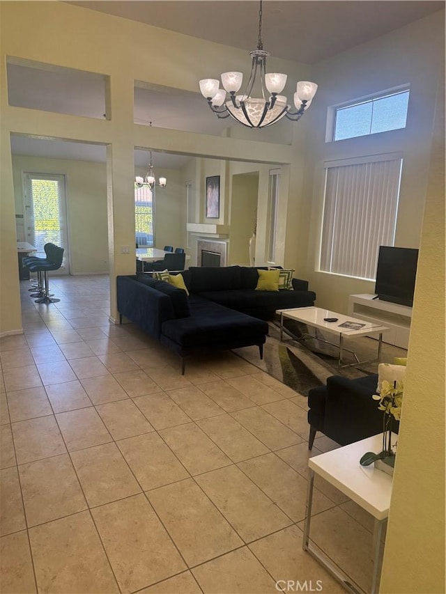 interior space featuring a wealth of natural light and a chandelier