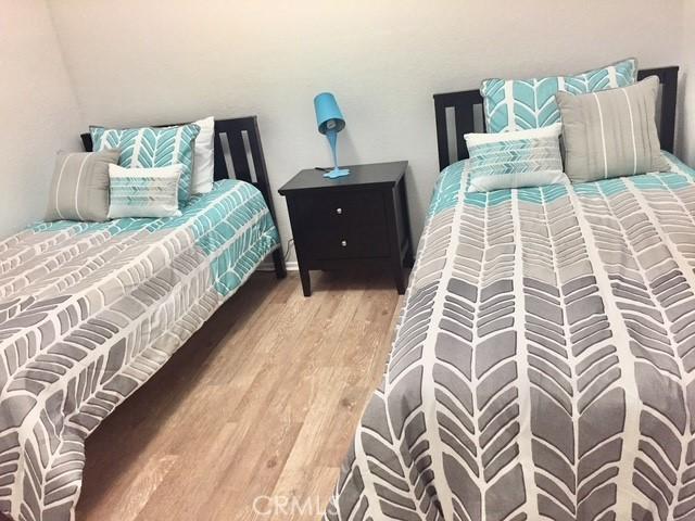 bedroom featuring hardwood / wood-style flooring