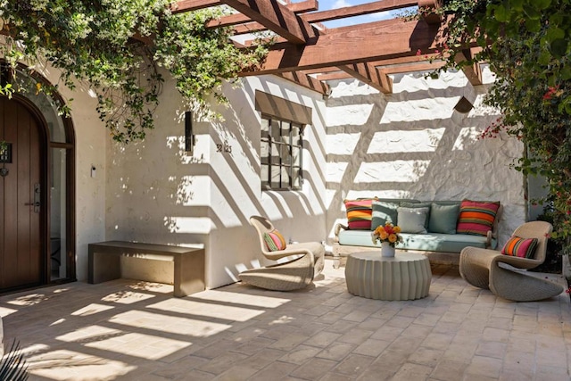 view of patio with an outdoor hangout area and a pergola