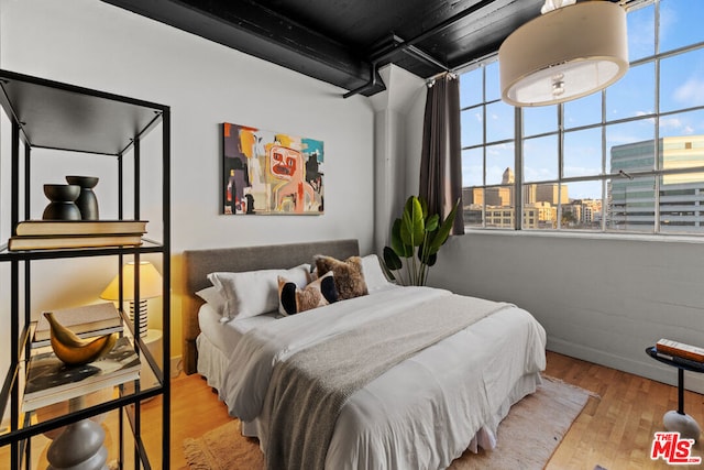 bedroom featuring light hardwood / wood-style floors