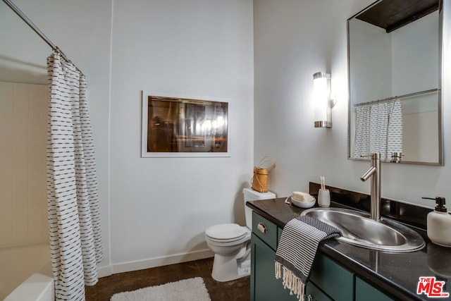 full bathroom featuring toilet, shower / tub combo, and vanity