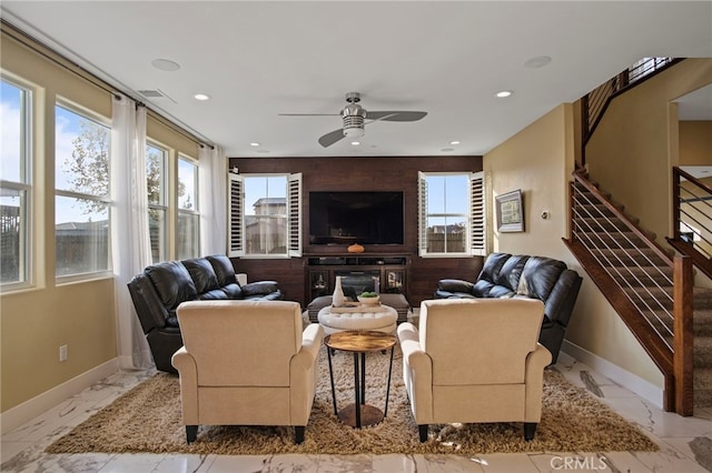 living room featuring ceiling fan