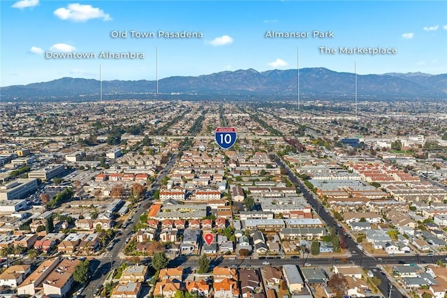 drone / aerial view featuring a mountain view