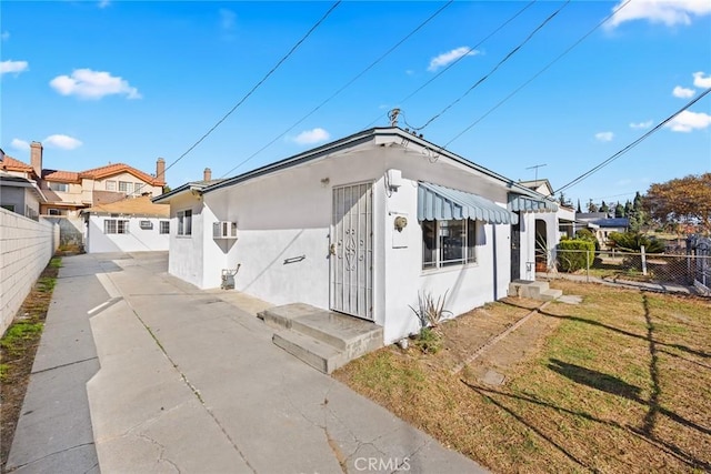 view of property exterior featuring a yard